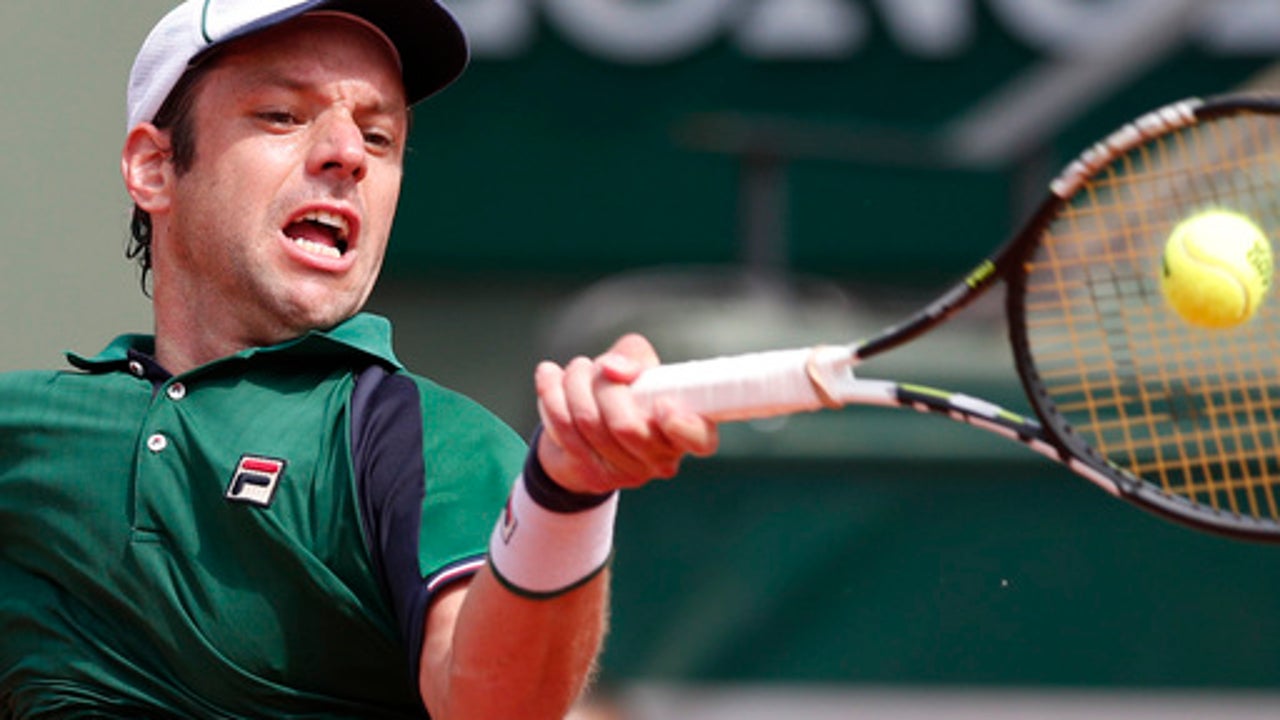 Tripped by a tarp: French Open player stops with bad ankle